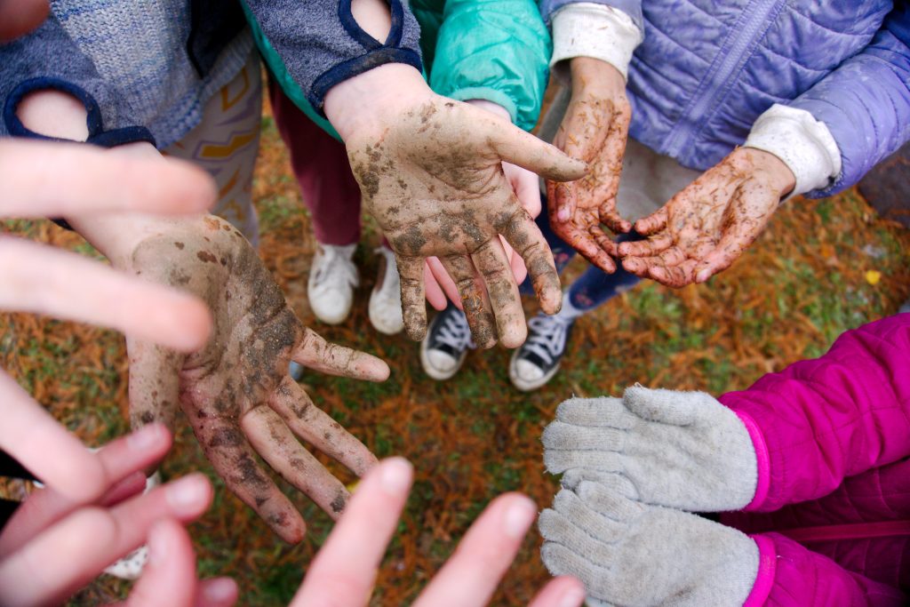 Fifth-graders after helping plant six new spice bush and witch hazels (Lindera benzoin and Hamamelis virginiana). Photo by R.M. Greene